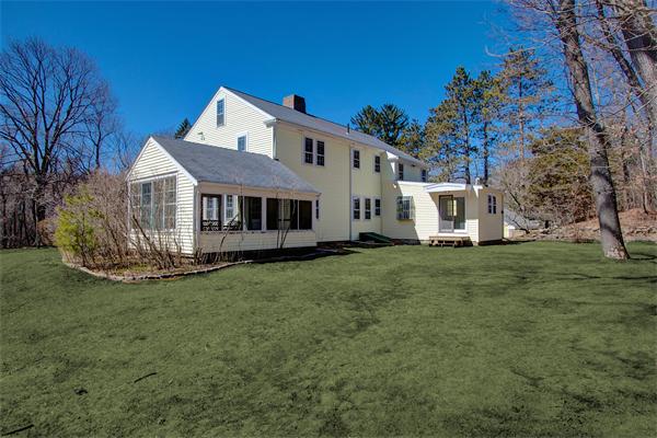 110 Belknap Road Framingham, MA 01701 - Photo 29 of 30 a view of a house with a yard and sitting area