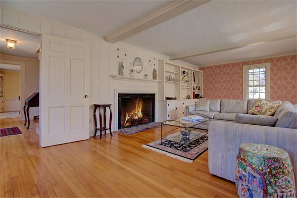 110 Belknap Road Framingham, MA 01701 - Photo 4 of 30 a living room with furniture and a fireplace