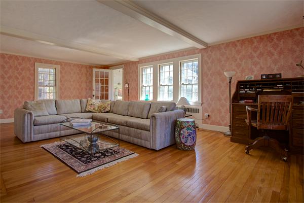 110 Belknap Road Framingham, MA 01701 - Photo 6 of 30 a living room with furniture and a wooden floor