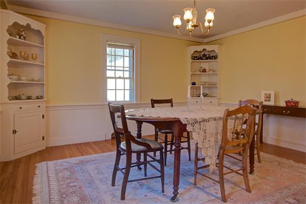110 Belknap Road Framingham, MA 01701 - Photo 7 of 30 a view of a dining room with furniture and chandelier