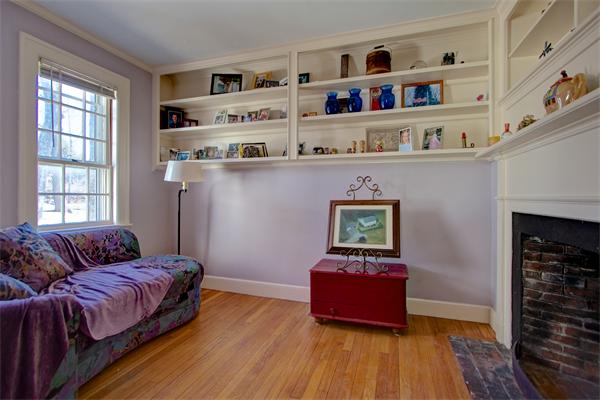 110 Belknap Road Framingham, MA 01701 - Photo 9 of 30 a living room with furniture and a wooden floor