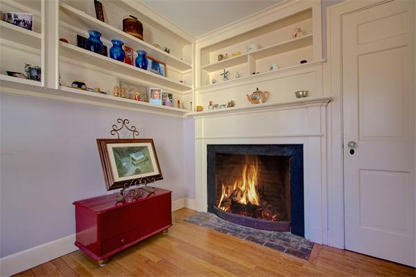 110 Belknap Road Framingham, MA 01701 - Photo 10 of 30 a living room with furniture and a fireplace