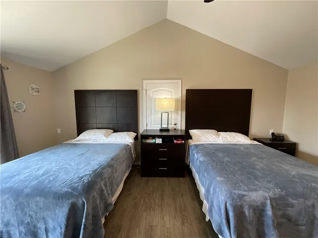 a living room with furniture ceiling fan and a rug