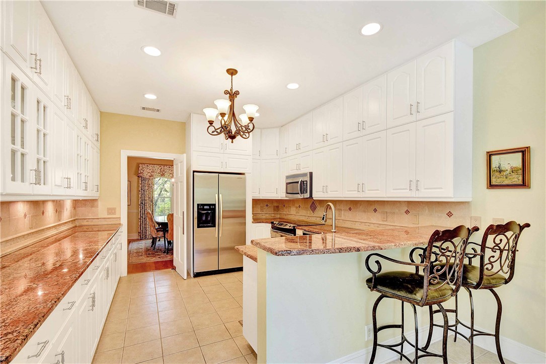 107 Biltmore St. Simons Island, GA 31522 - Photo 10 of 34 Kitchen with Custom Cabinets