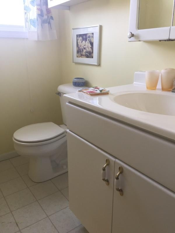 1560 Benjamin Road Muskegon, MI 49445 - Photo 15 of 21 Bathroom 3-16-15.jpg