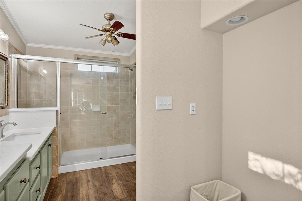 4474 South Fm 200 Nemo Nemo, TX 76070 - Photo 16 of 40 a bathroom with a granite countertop bathtub shower sink vanity and toilet