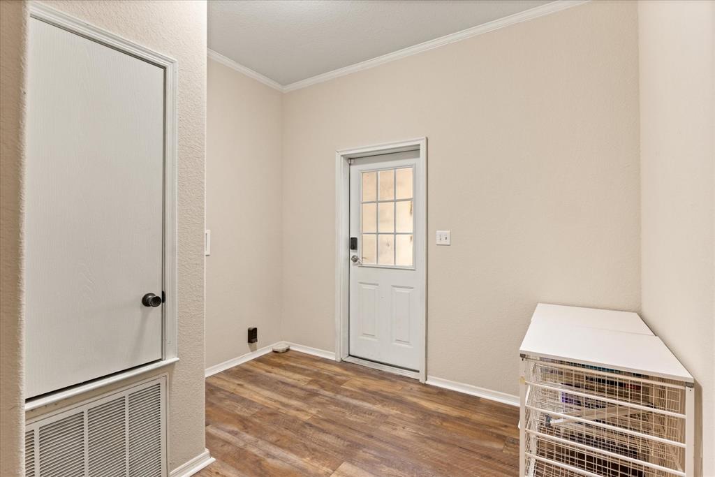 4474 South Fm 200 Nemo Nemo, TX 76070 - Photo 27 of 40 a view of a livingroom with wooden floor and cabinet