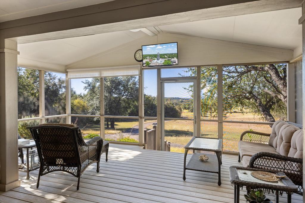 4474 South Fm 200 Nemo Nemo, TX 76070 - Photo 3 of 40 a living room with furniture and a floor to ceiling window