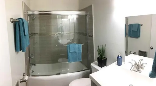 a bath tub sitting next to a bathroom