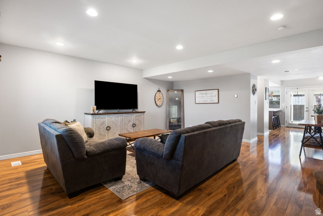 41 Benchmark Village Tooele, UT 84074 - Photo 5 of 26 Living area with hardwood / wood-style flooring and recessed lighting