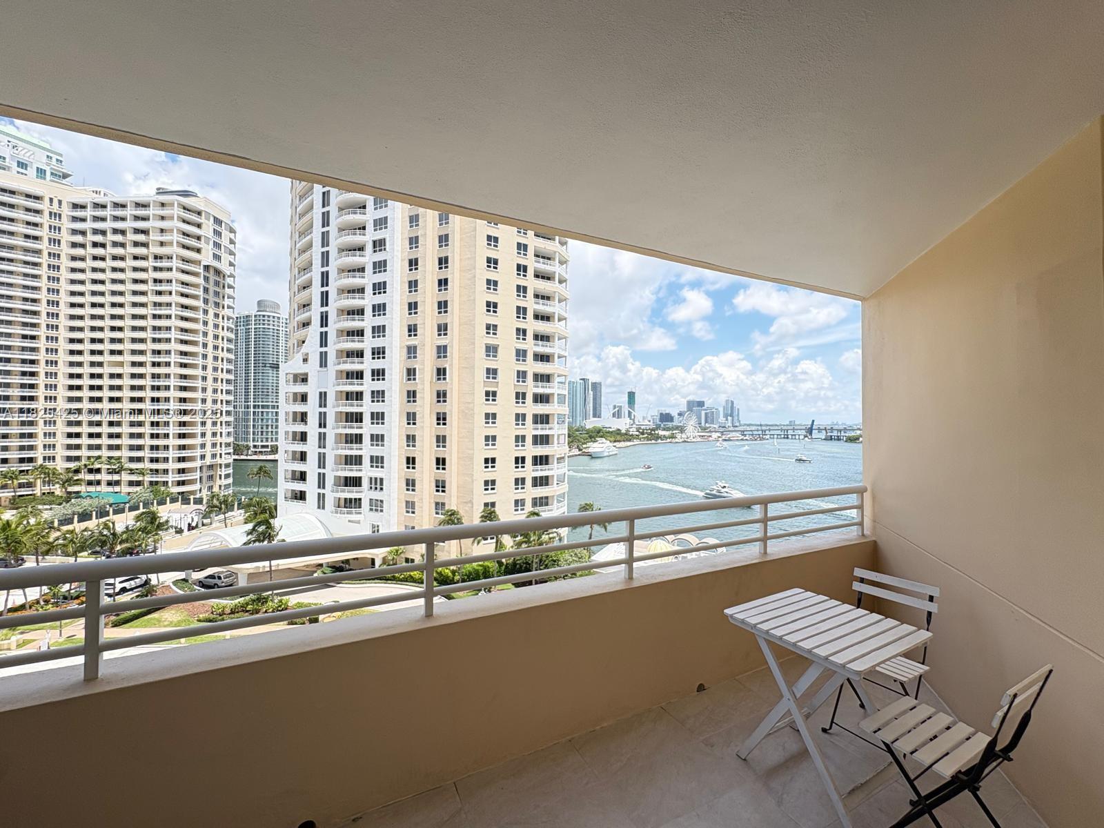 808 Brickell Key Drive, Unit 1103 Miami, FL 33131 - Photo 11 of 12 a view of a large building and outdoor space