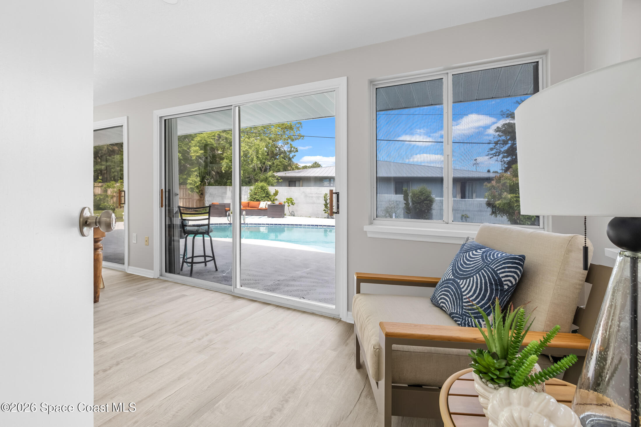 24 Hardee Circle South Rockledge, FL 32955 - Photo 5 of 6 a living room with furniture and a large window