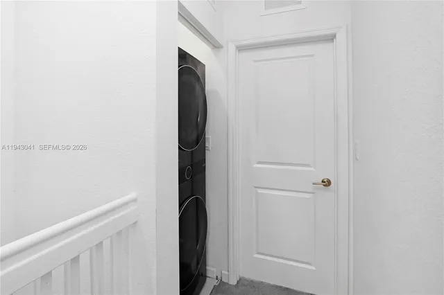 a view of a utility room with washer and dryer
