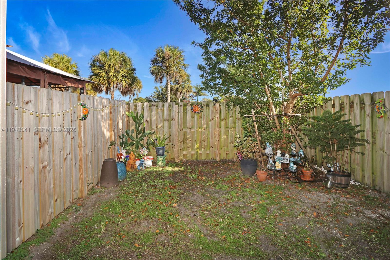 10125 Southwest 228th Terrace Miami, FL 33190 - Photo 23 of 26 a view of outdoor space with garden and entertaining space
