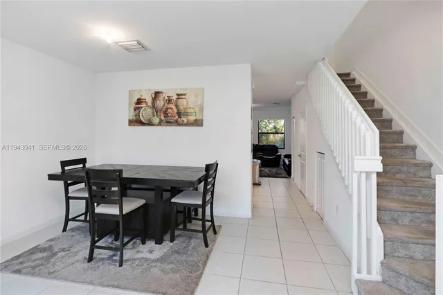 a view of a dining room with furniture