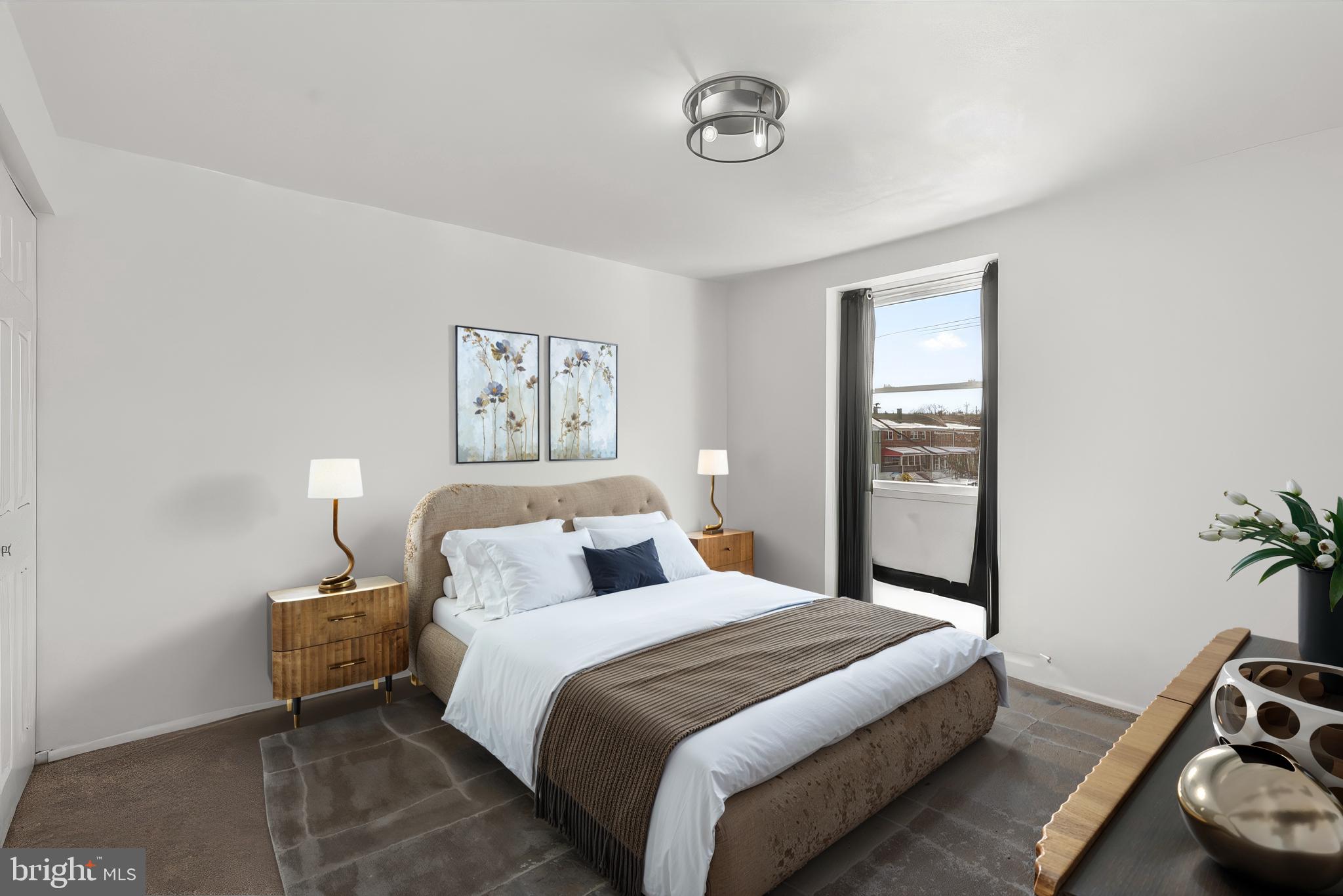 40 Bladen Road Baltimore, MD 21221 - Photo 17 of 44 a bedroom with a bed and painting on the wall