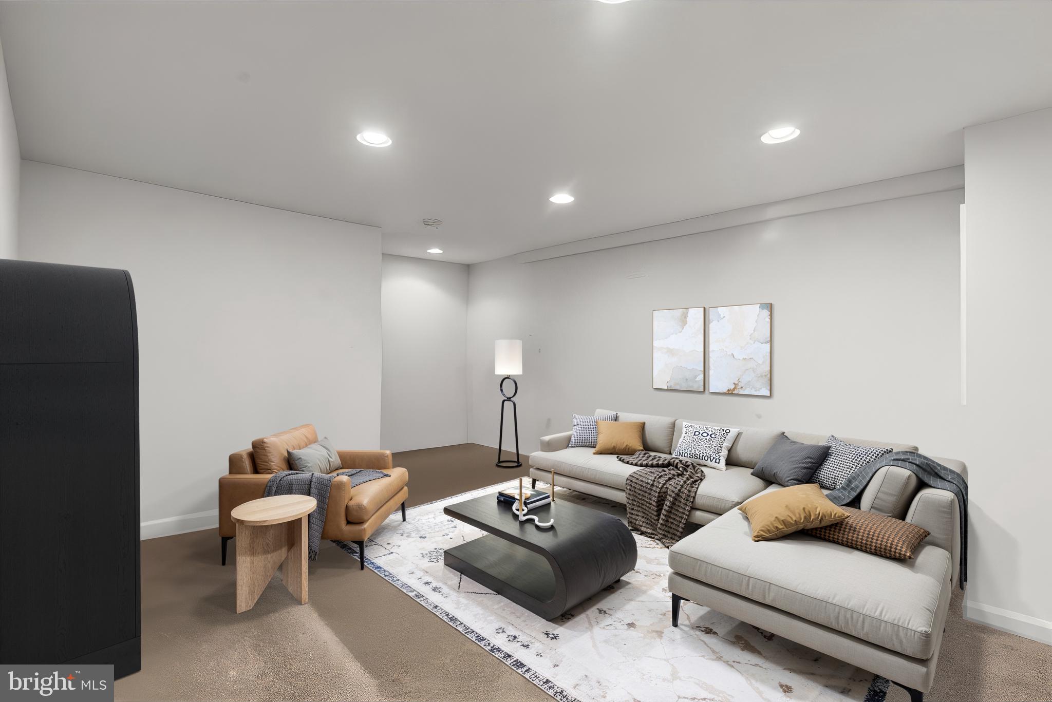 40 Bladen Road Baltimore, MD 21221 - Photo 30 of 44 a living room with furniture and a wooden floor