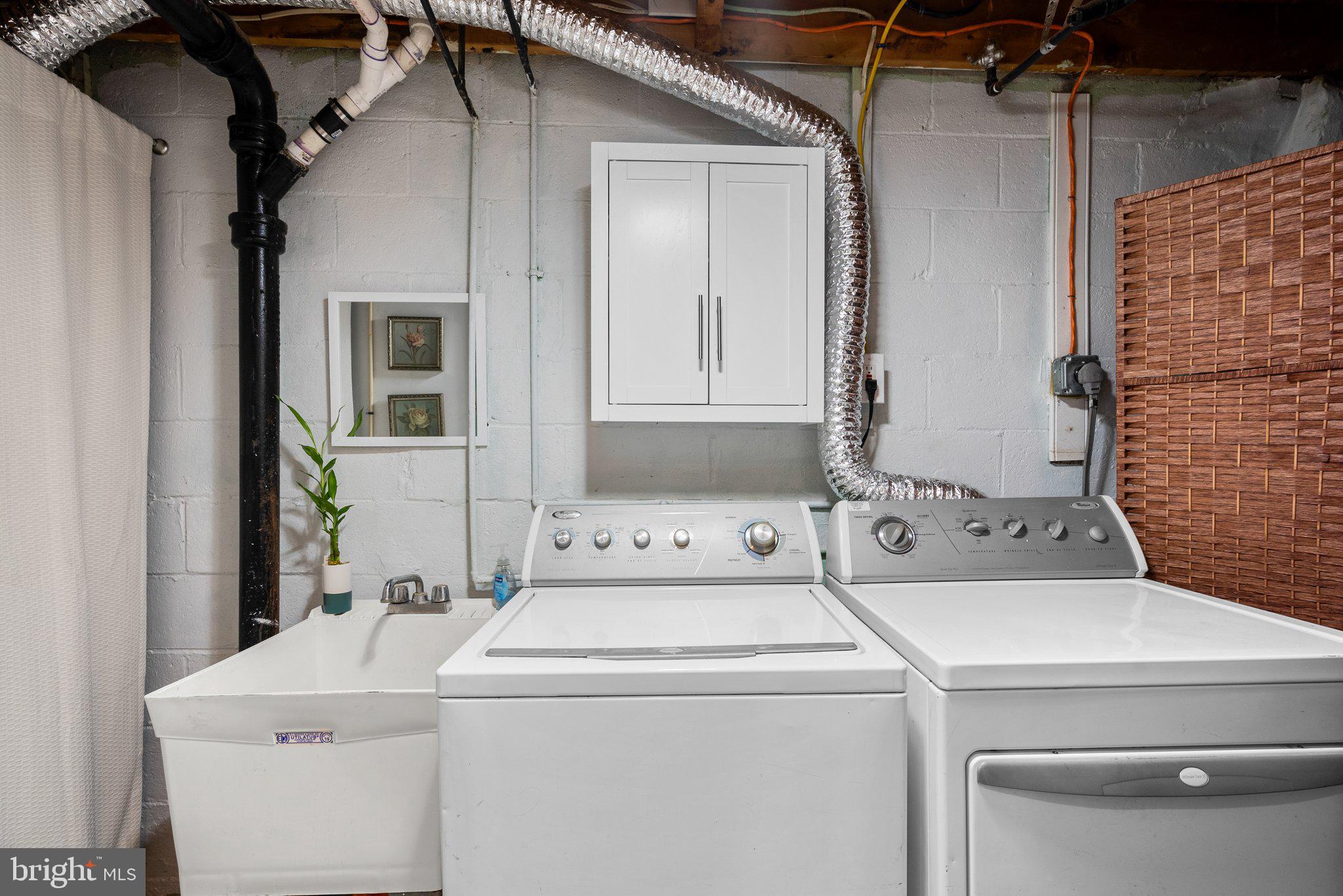 40 Bladen Road Baltimore, MD 21221 - Photo 35 of 44 a utility room with dryer and washer
