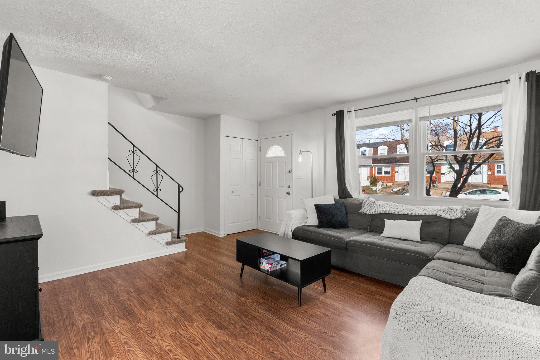 40 Bladen Road Baltimore, MD 21221 - Photo 7 of 44 a living room with furniture and a large window