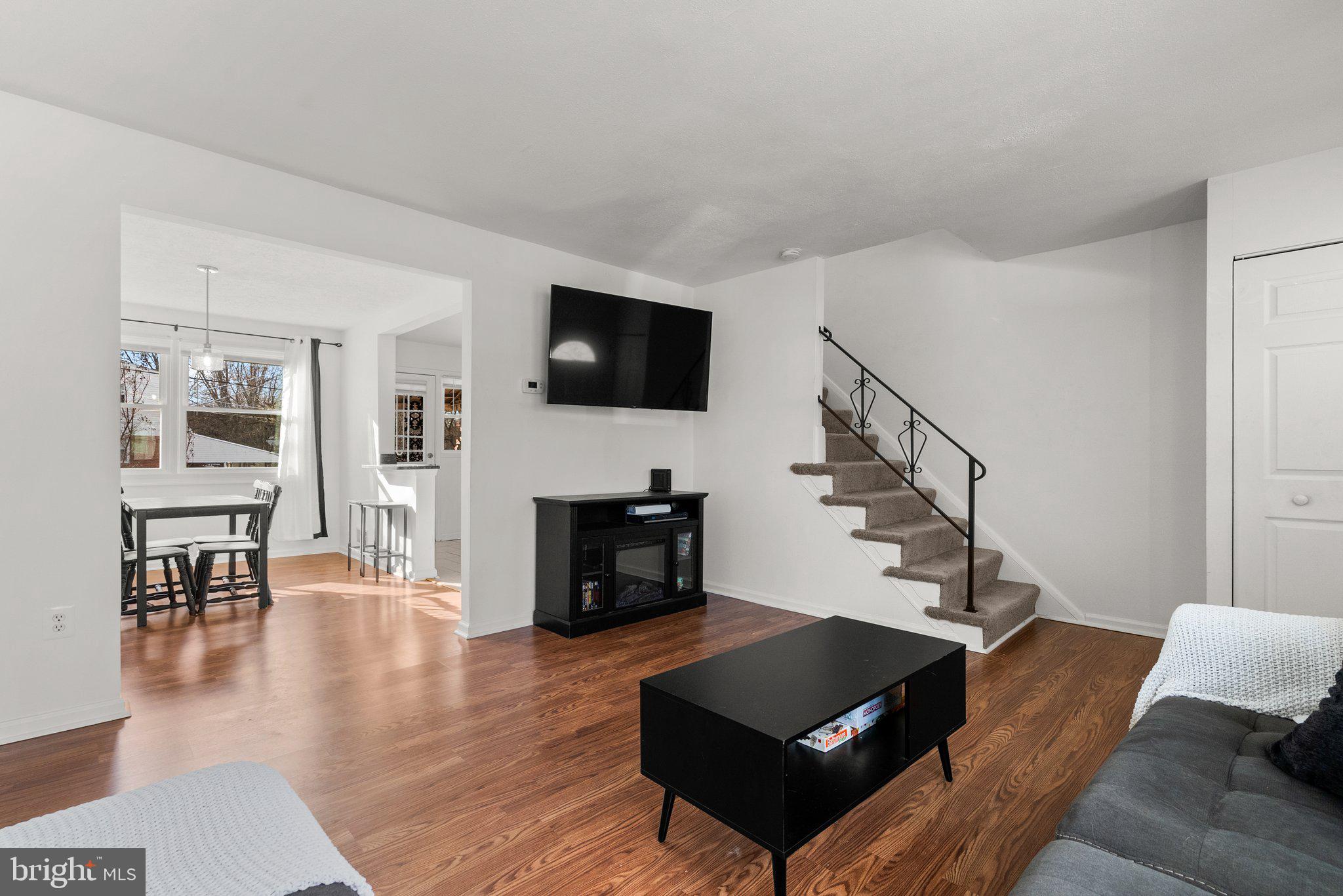 40 Bladen Road Baltimore, MD 21221 - Photo 8 of 44 a living room with furniture and a flat screen tv
