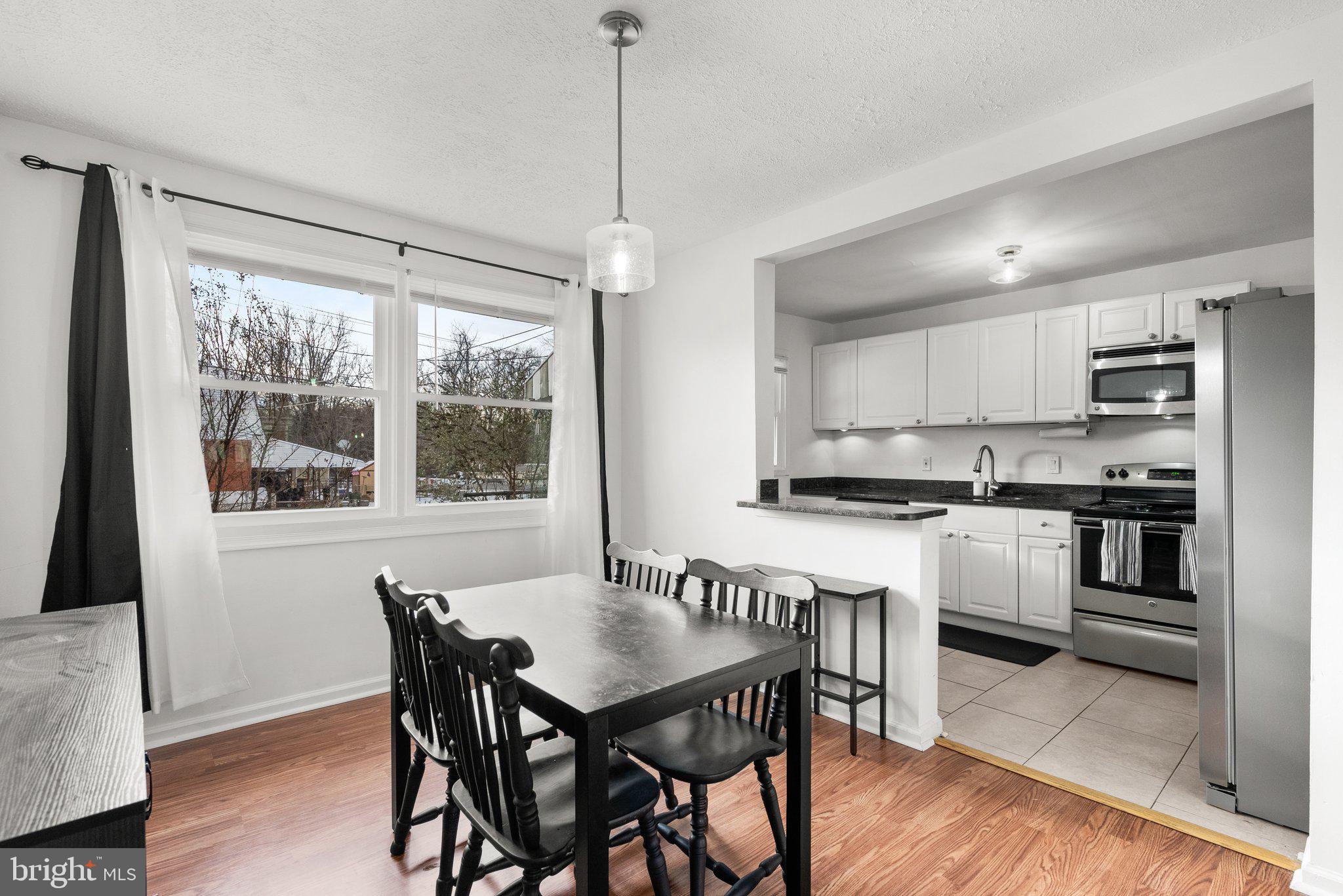 40 Bladen Road Baltimore, MD 21221 - Photo 10 of 44 a view of kitchen with cabinets table and chairs