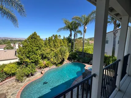 a view of a backyard with a garden