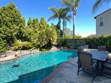 a view of a table and chairs in patio