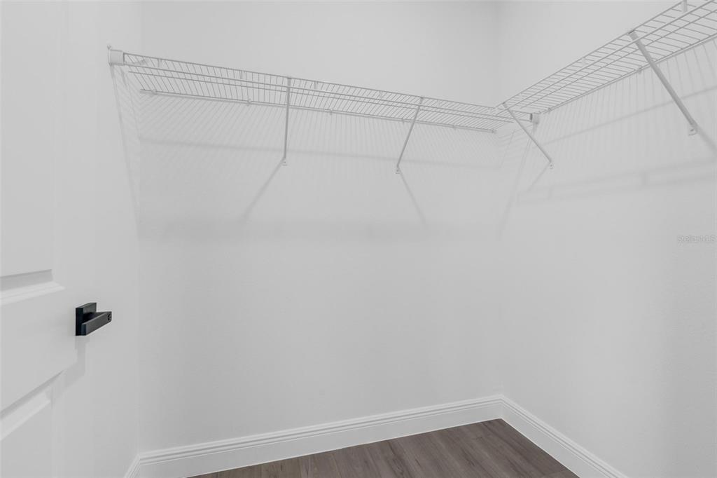 17109 Southwest 41st Circle Ocala, FL 34473 - Photo 39 of 72 a view of a room with racks on the wall