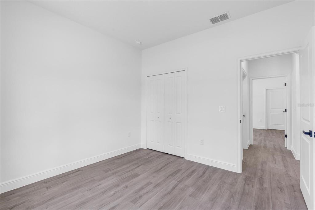 17109 Southwest 41st Circle Ocala, FL 34473 - Photo 42 of 72 a view of a room with wooden floor