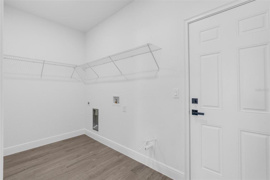 17109 Southwest 41st Circle Ocala, FL 34473 - Photo 51 of 72 a view of a room with wooden floor