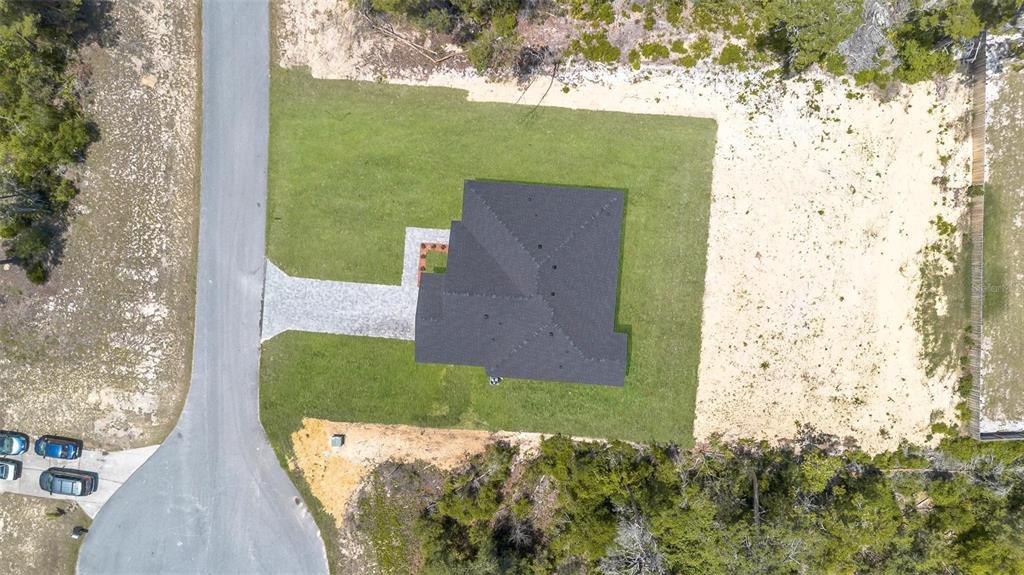 17109 Southwest 41st Circle Ocala, FL 34473 - Photo 58 of 72 an aerial view of a house with a yard