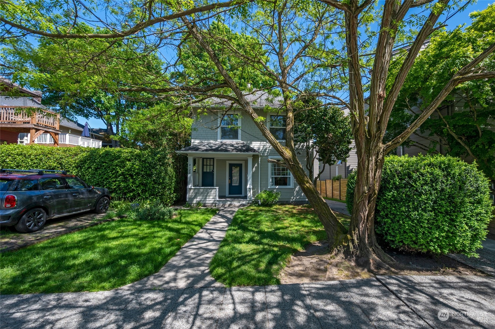 a house view with a garden space