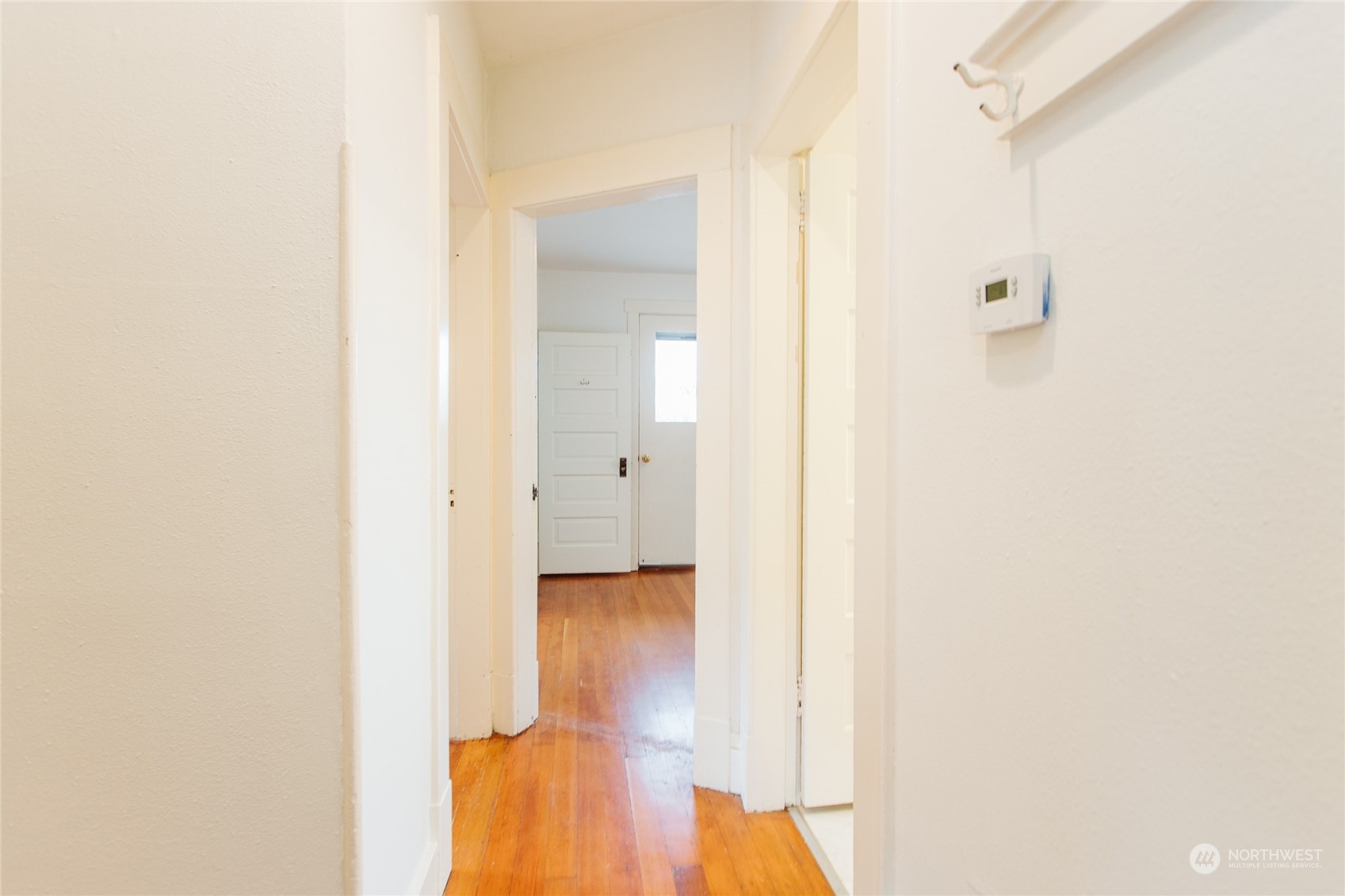 4122 Whitman Avenue North Seattle, WA 98103 - Photo 16 of 28 a view of a bathroom with a shower and a mirror
