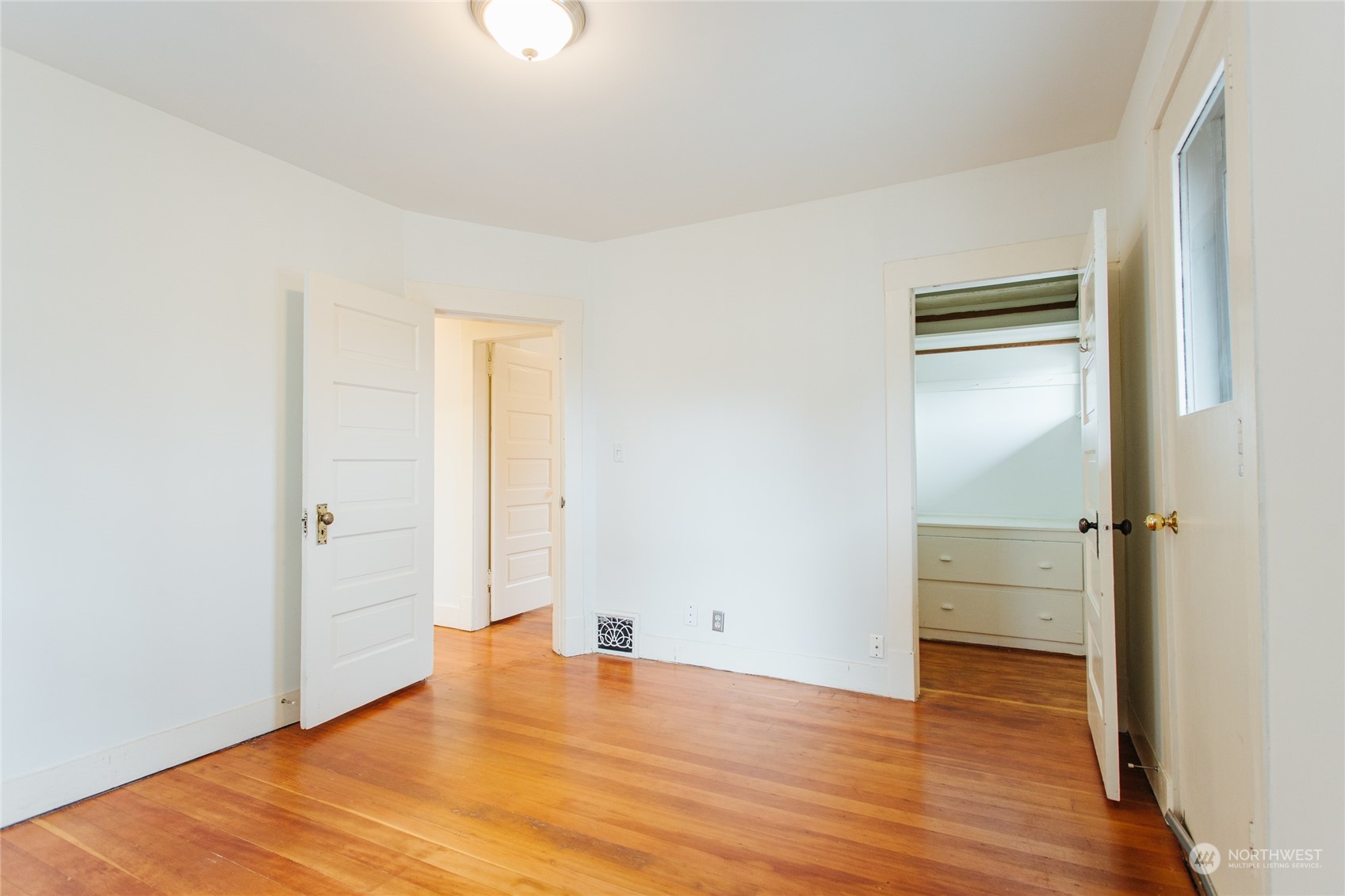 4122 Whitman Avenue North Seattle, WA 98103 - Photo 20 of 28 a view of empty room with wooden floor