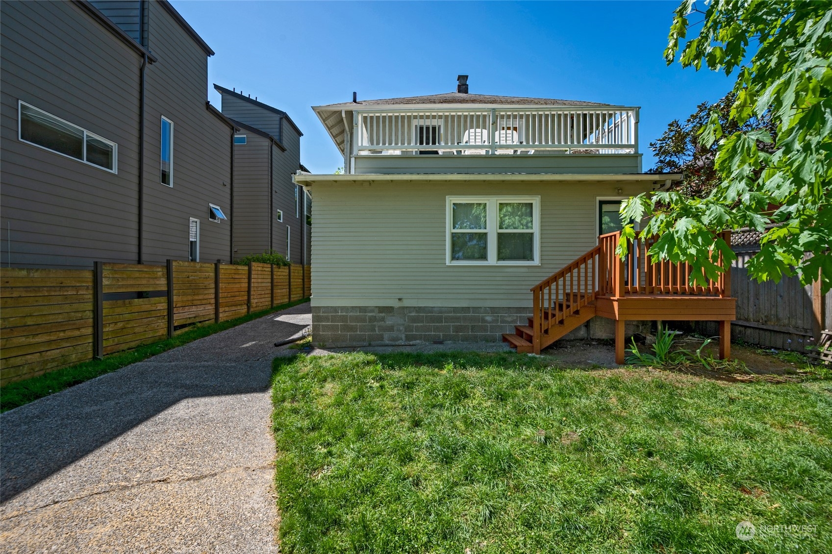 4122 Whitman Avenue North Seattle, WA 98103 - Photo 27 of 28 a view of a house with a yard