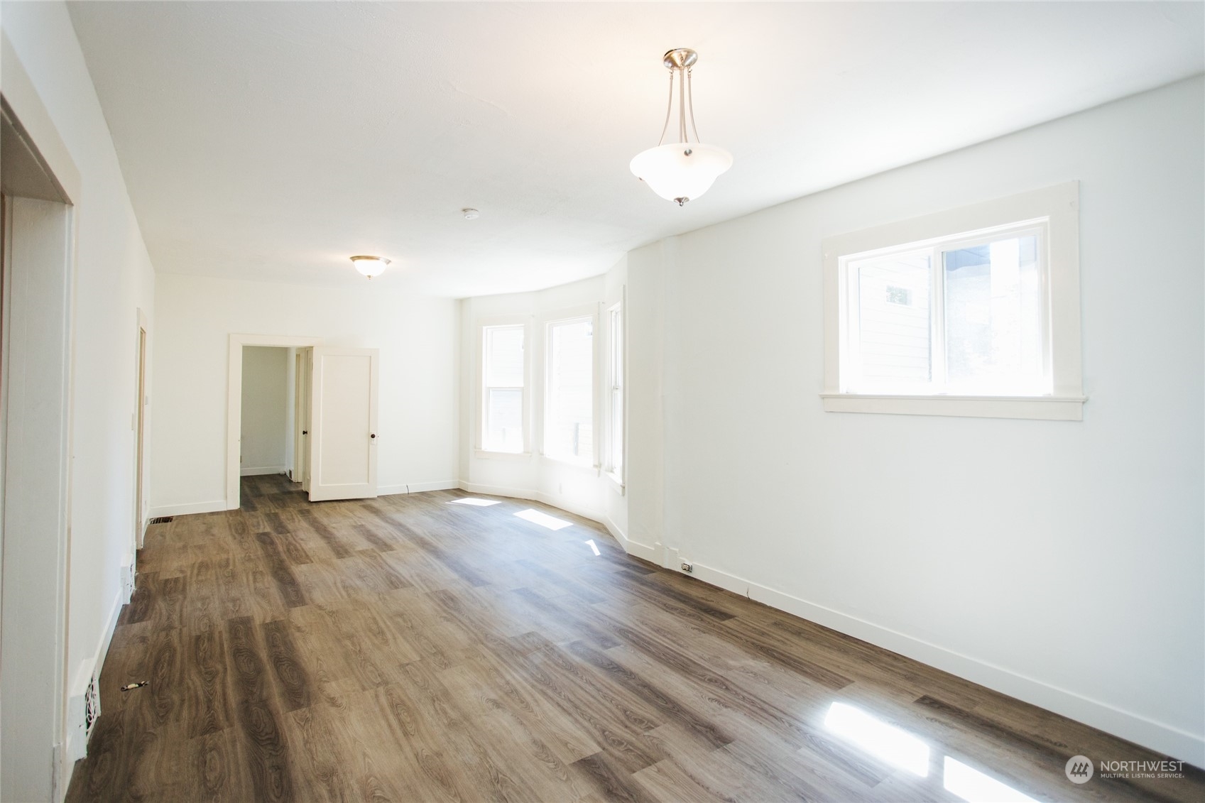 4122 Whitman Avenue North Seattle, WA 98103 - Photo 5 of 28 a view of an empty room and window
