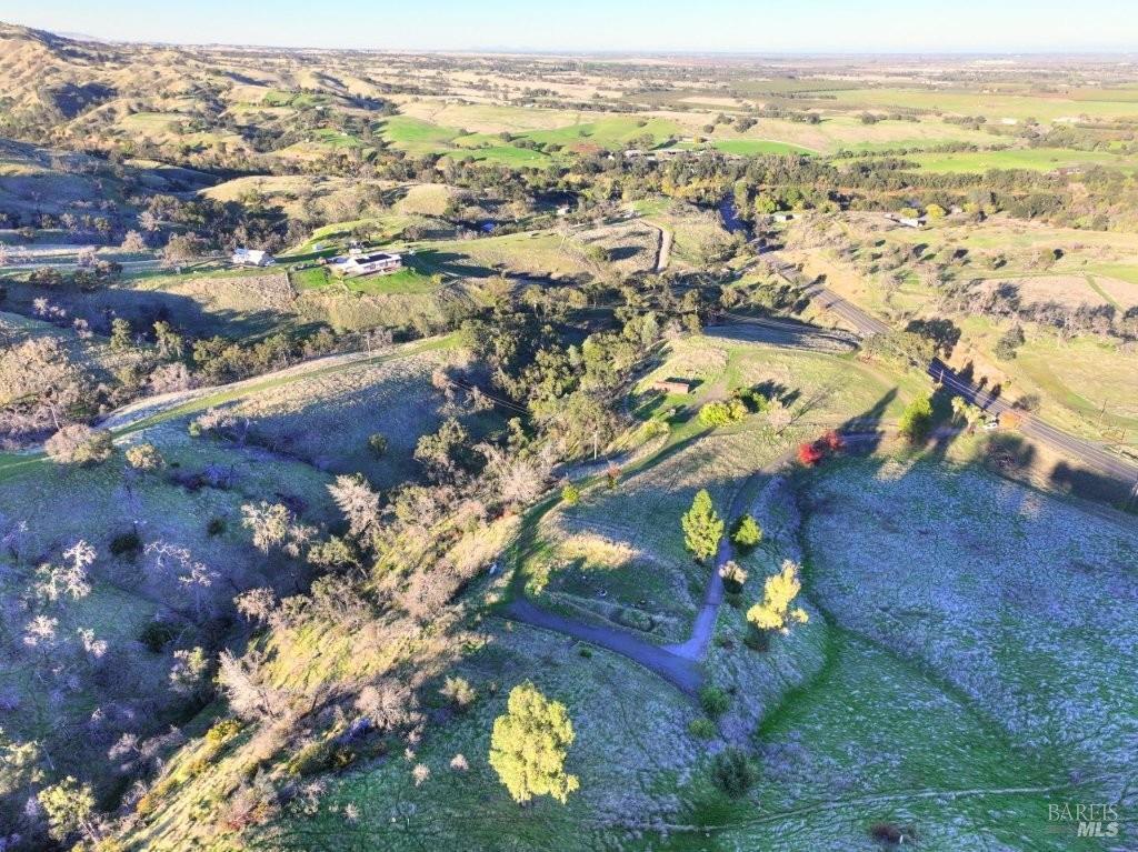 8588 Pleasants Valley Road Winters, CA 95694 - Photo 15 of 18 an aerial view of lake and residential houses with outdoor space