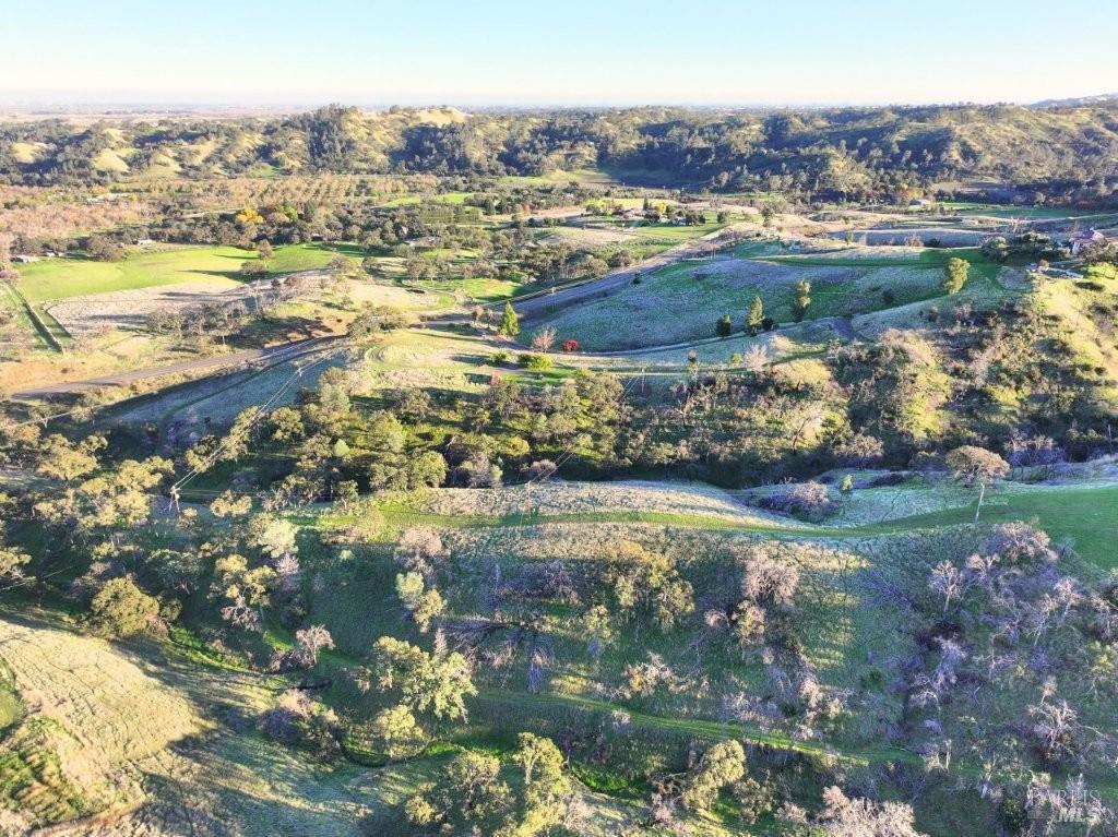 8588 Pleasants Valley Road Winters, CA 95694 - Photo 16 of 18 a view of a lake with a city