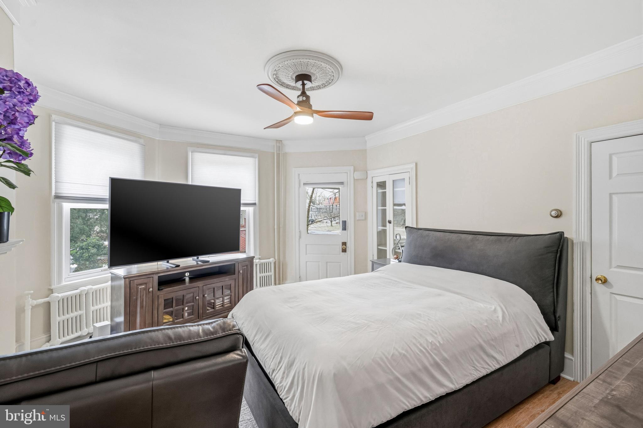 213 South Church Street Moorestown, NJ 08057 - Photo 11 of 54 a bedroom with a bed and a flat screen tv