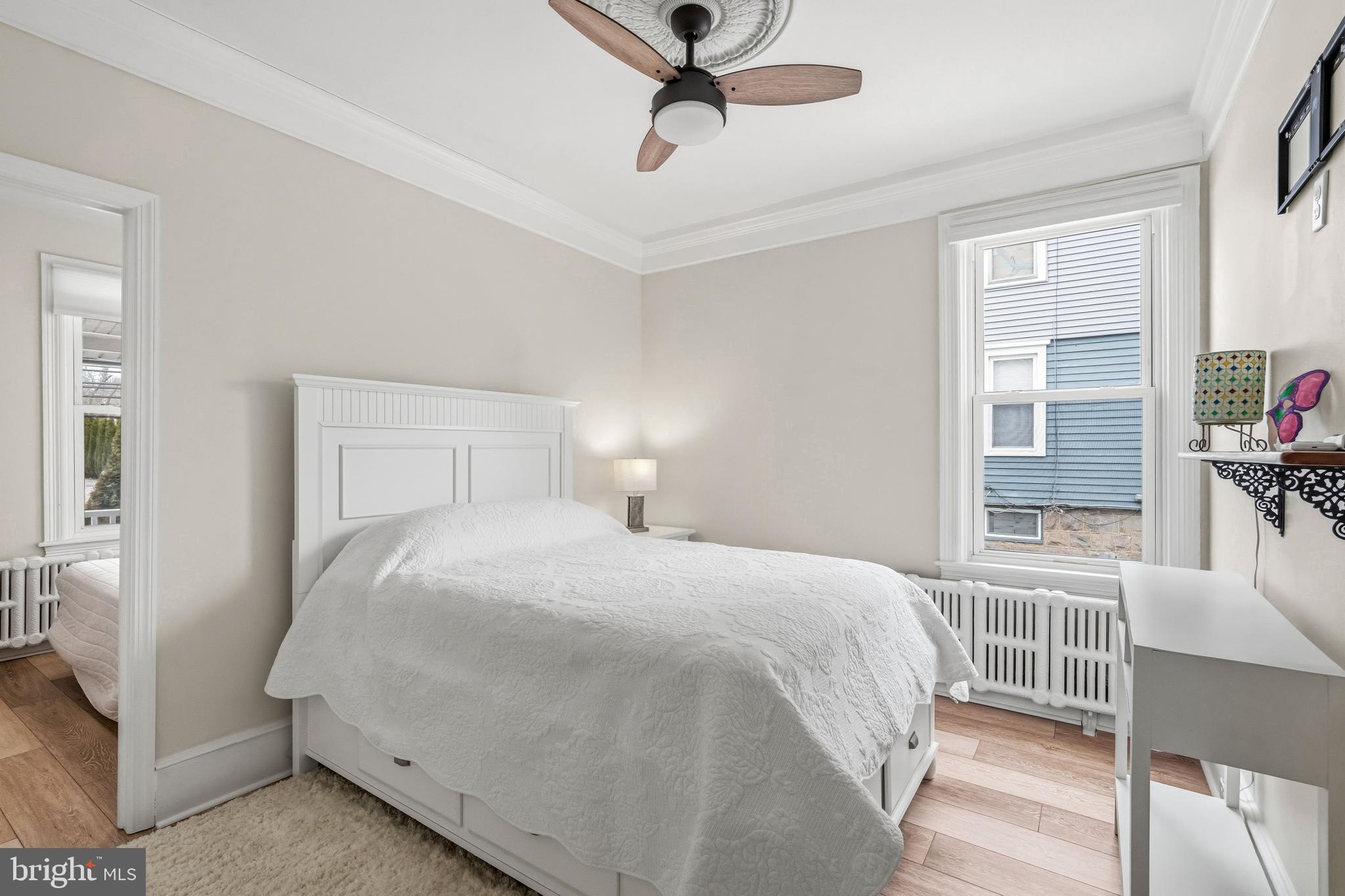 213 South Church Street Moorestown, NJ 08057 - Photo 14 of 54 a bedroom with a bed and a window