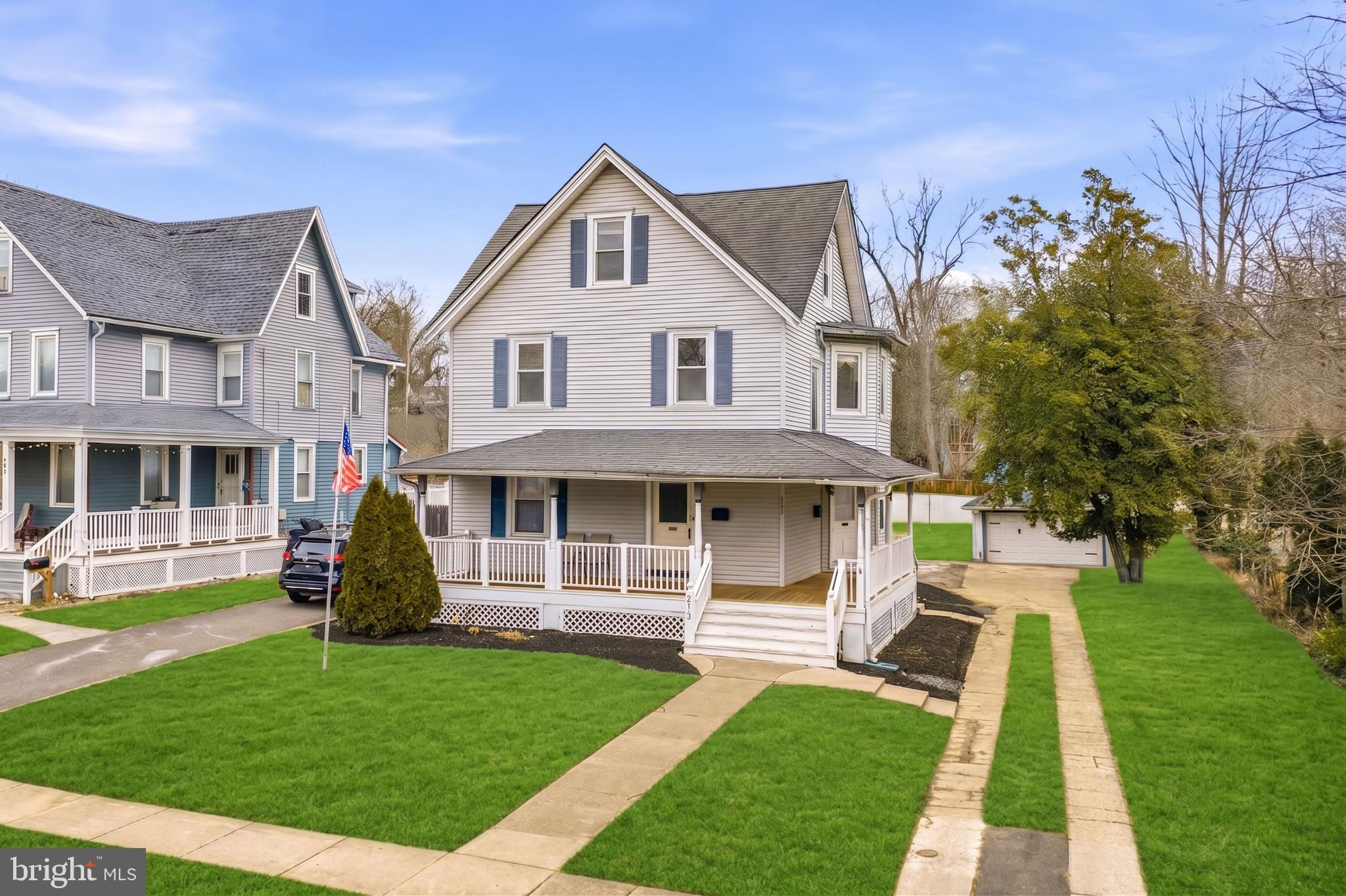 213 South Church Street Moorestown, NJ 08057 - Photo 2 of 54 a front view of a house with a yard