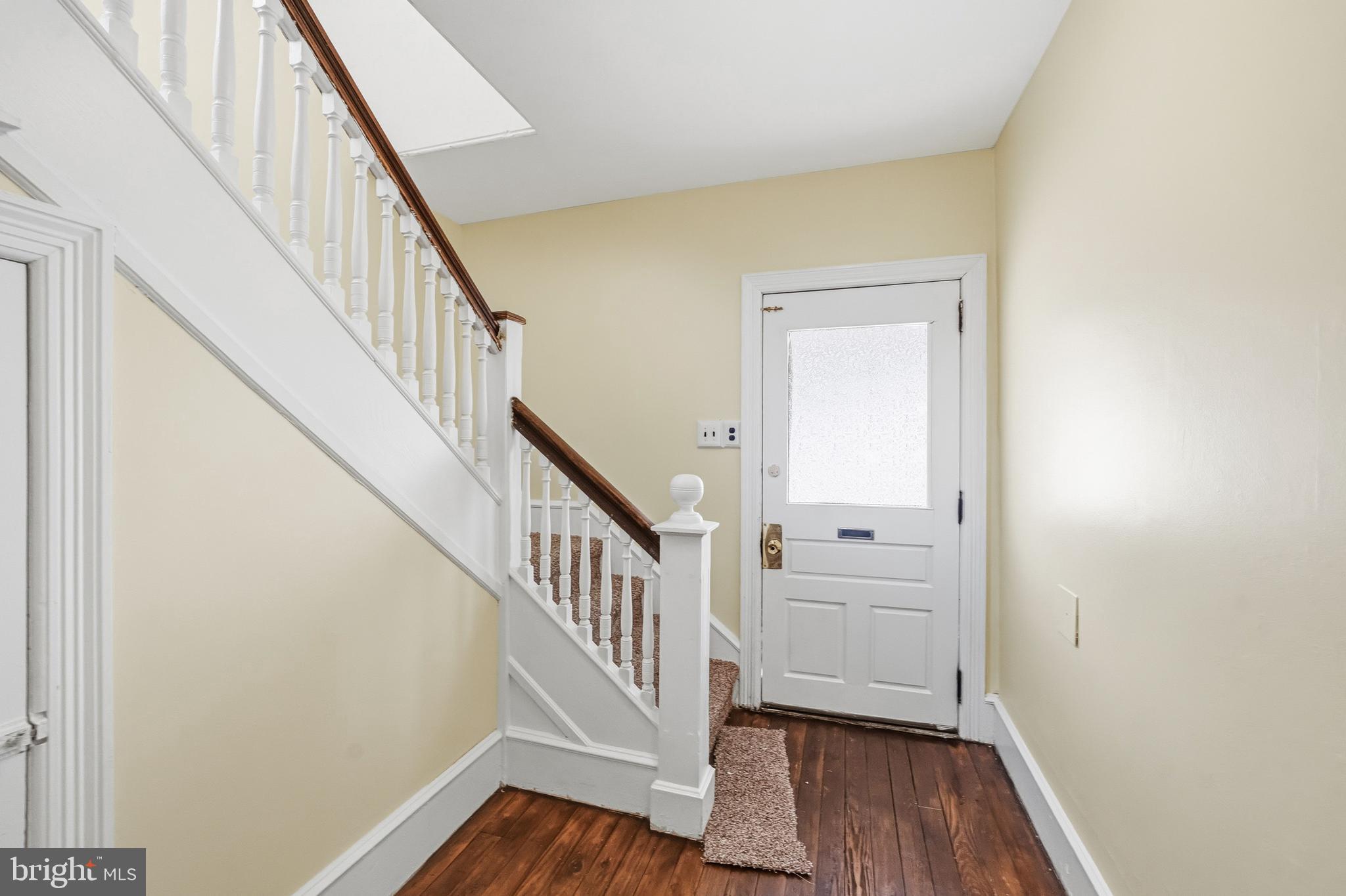 213 South Church Street Moorestown, NJ 08057 - Photo 23 of 54 a view of a hallway with wooden floor and staircase