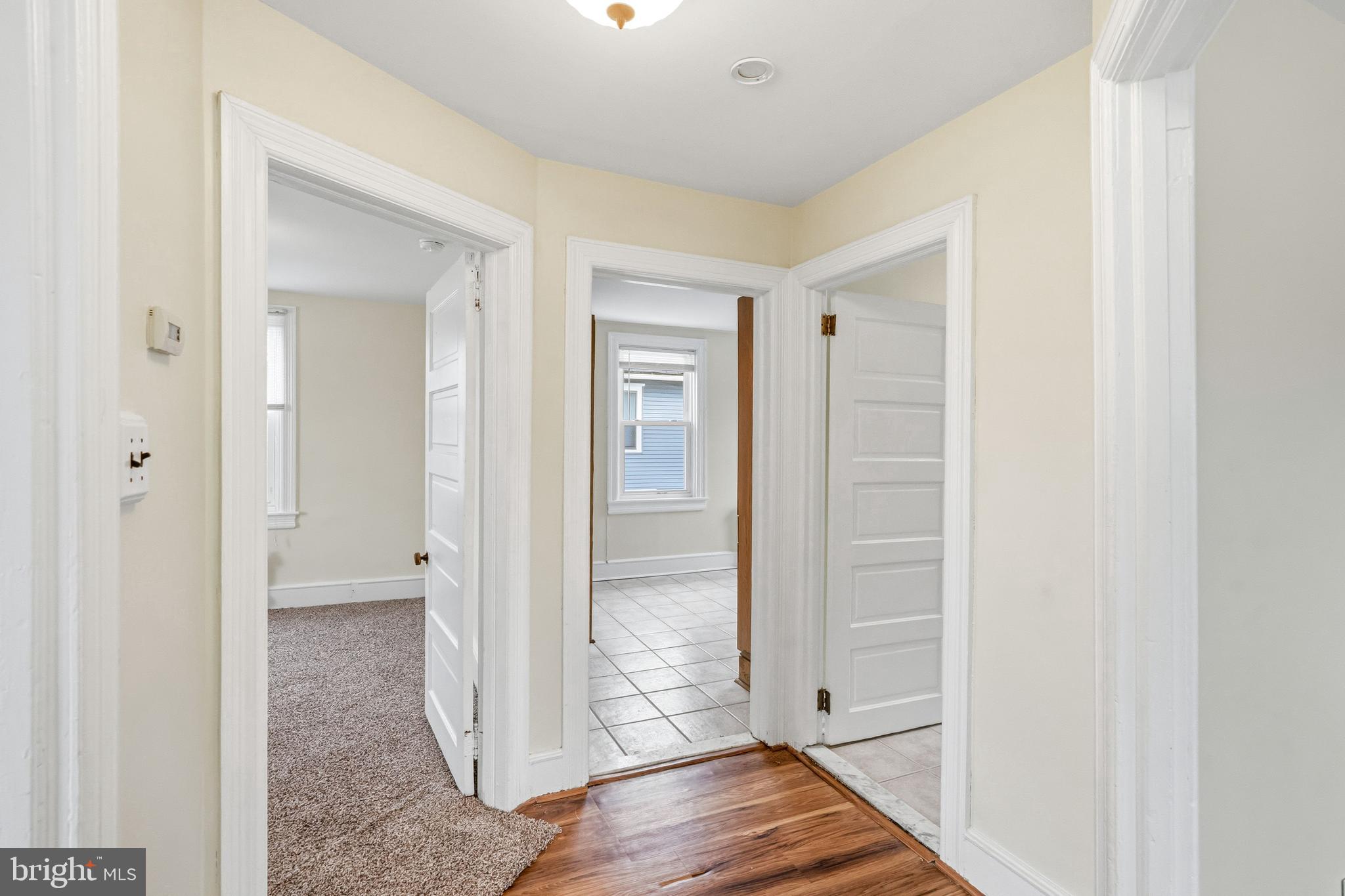 213 South Church Street Moorestown, NJ 08057 - Photo 25 of 54 an empty room with wooden floor & door