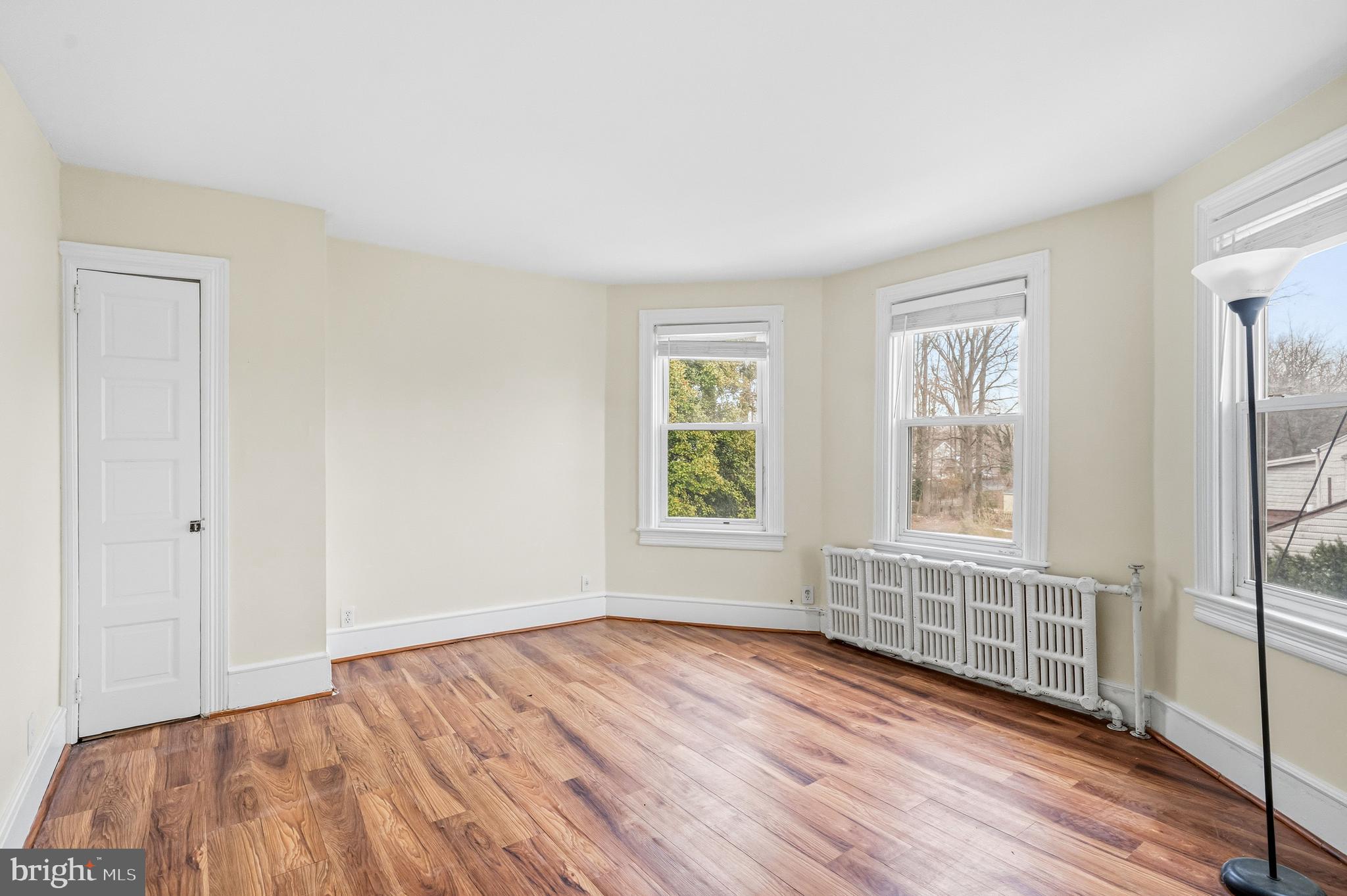 213 South Church Street Moorestown, NJ 08057 - Photo 26 of 54 an empty room with wooden floor and windows