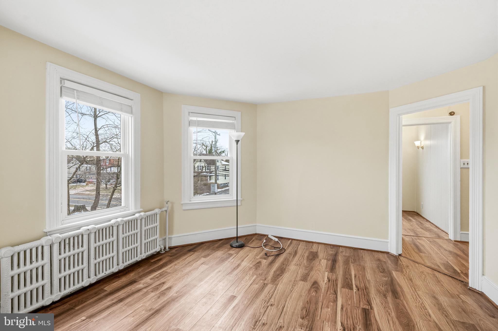 213 South Church Street Moorestown, NJ 08057 - Photo 27 of 54 an empty room with wooden floor and windows