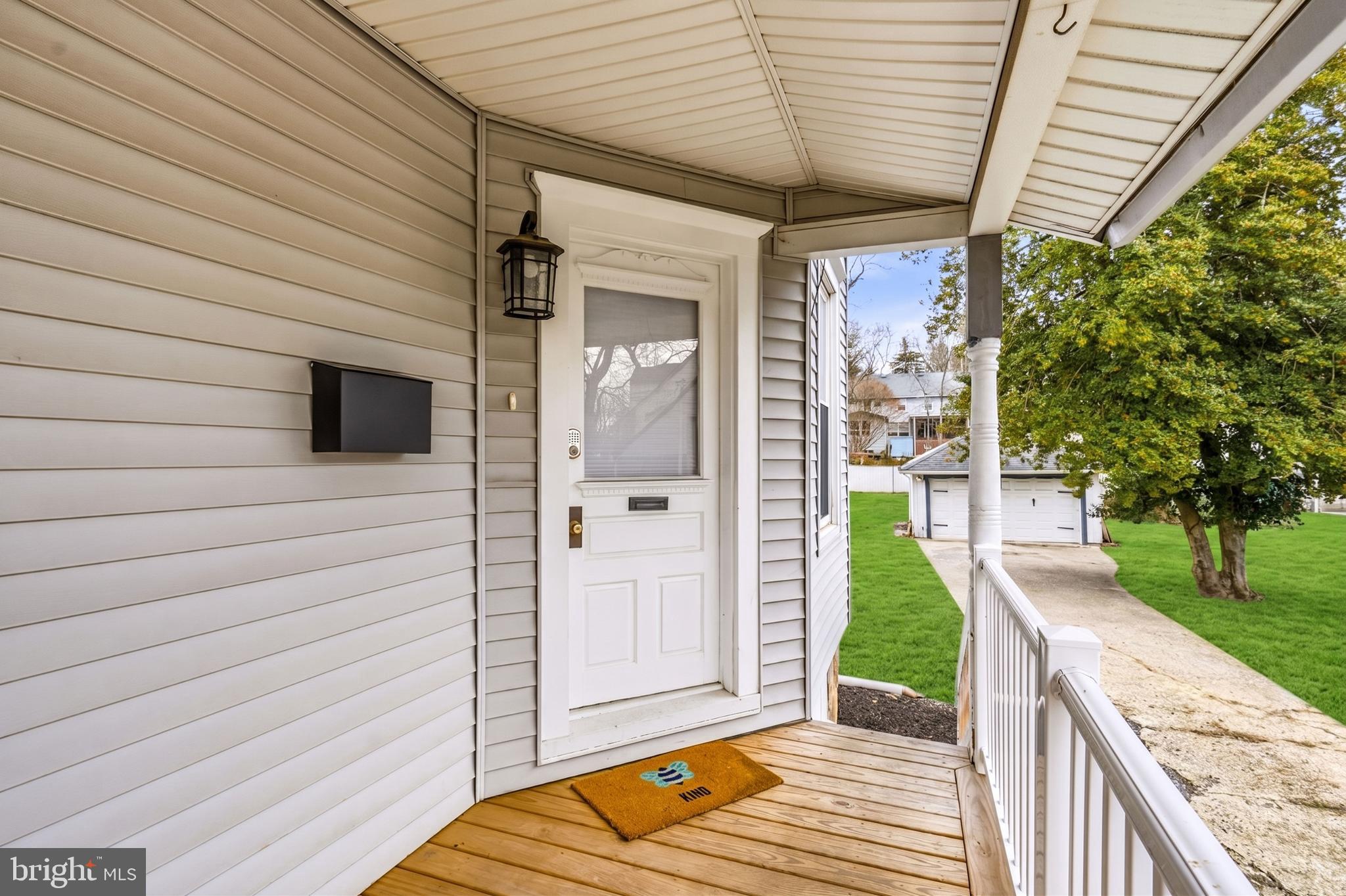213 South Church Street Moorestown, NJ 08057 - Photo 3 of 54 a view of a porch with wooden floor