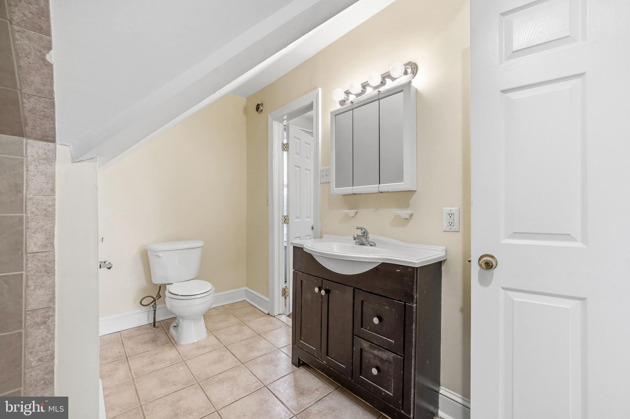 213 South Church Street Moorestown, NJ 08057 - Photo 42 of 54 a bathroom with a sink vanity and a toilet