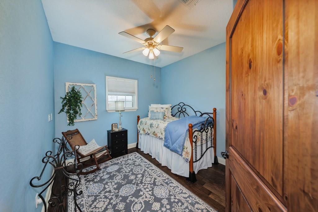 4460 Hildreth Pool Road Bowie, TX 76230 - Photo 20 of 40 a bedroom with a bed and window
