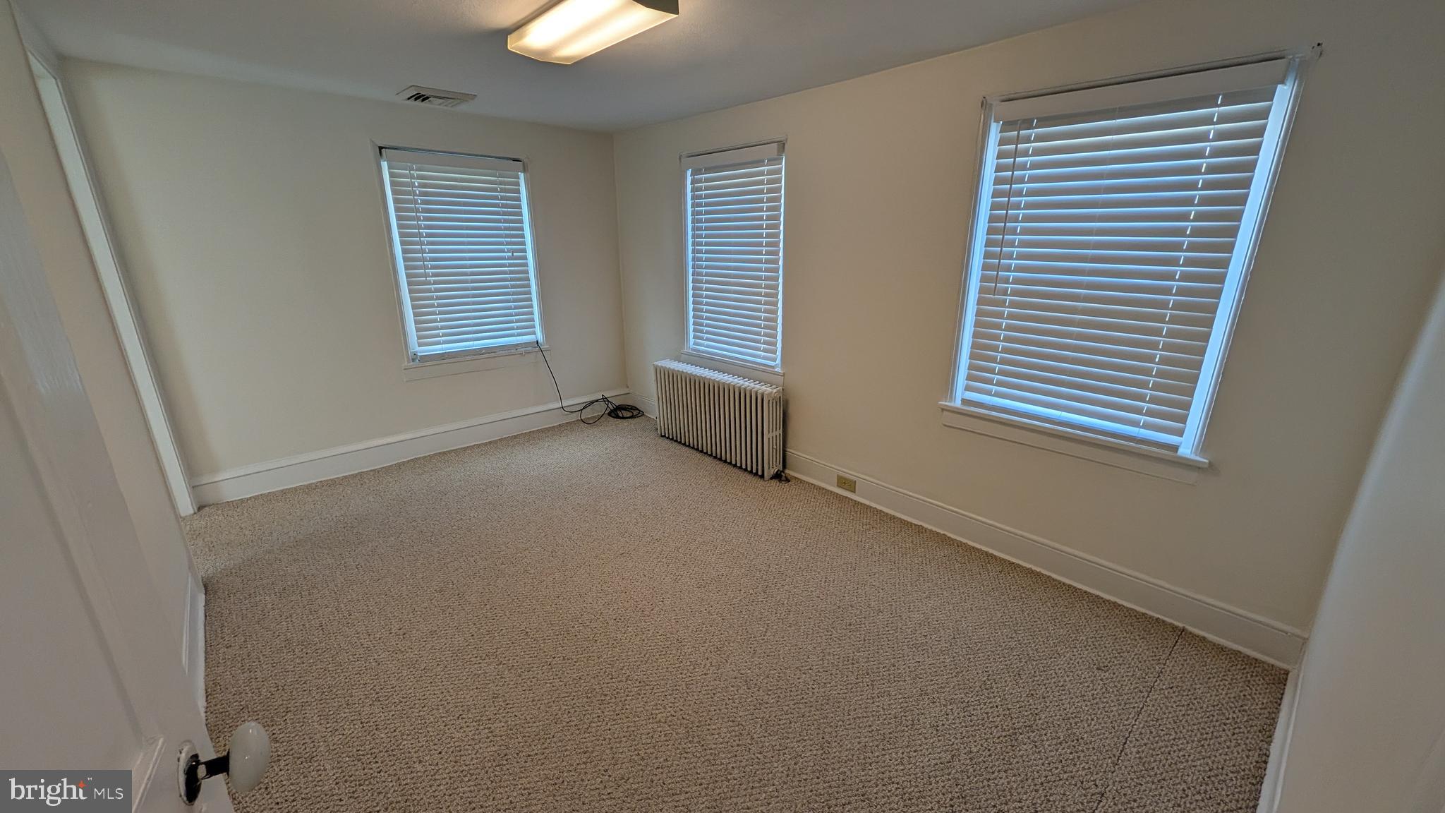 302 Leidy Road, Unit 2 Souderton, PA 18964 - Photo 18 of 23 an empty room with windows