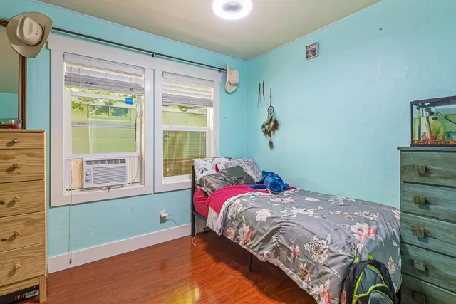 a view of a backyard with sitting area